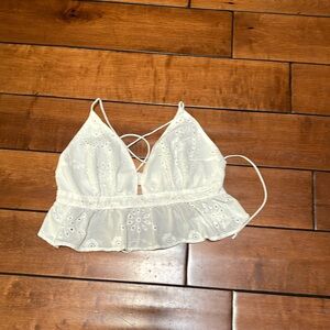 Adorable, white eyelet halter with elastic back and spaghetti straps